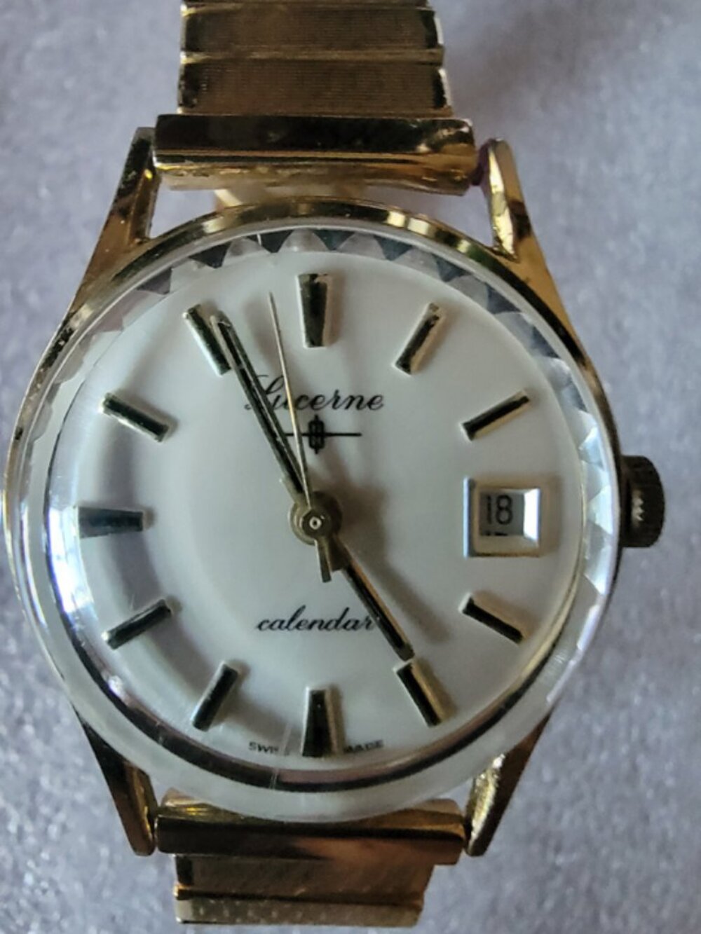 Vintage Lucerne Swiss Made Calendar Watch with original Lucerne watch band.